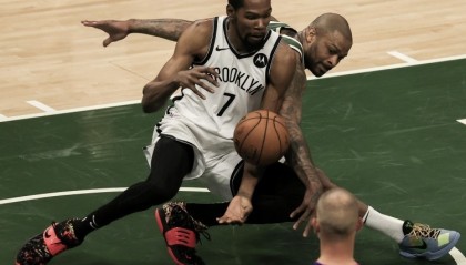 字母哥暴扣统治攻防两端,雄鹿加时险胜篮网显韧性